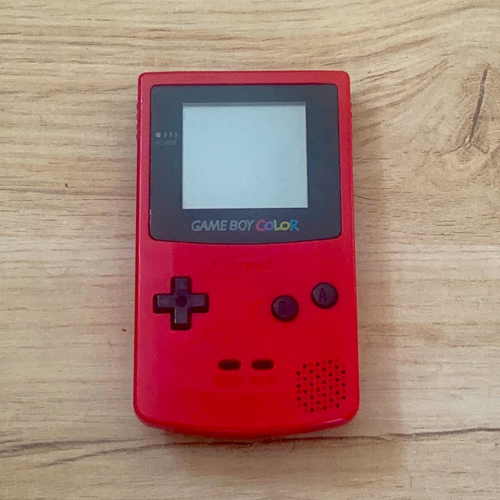 NINTENDO Game Boy Color in red, with Tetris game included.